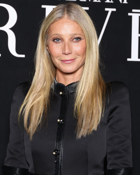 Gwyneth Paltrow posing in a black jacket
